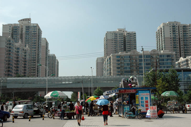 Merchants line the way from the metro to the apartments